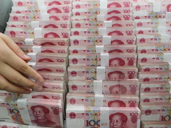 Trung Quốc bán ròng ngoại tệ kỷ lục để hỗ trợ đồng nội tệ