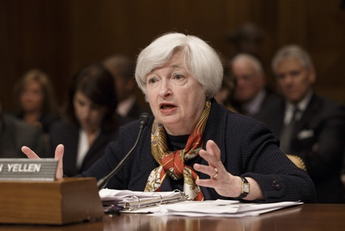 Phố Wall biến động khó đoán sau quyết định của Fed