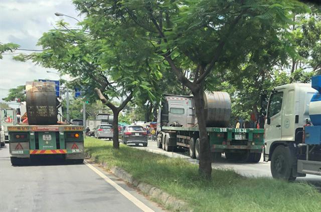 Phương tiện đi đường Nguyễn Văn Linh phải đóng phí bao nhiêu?