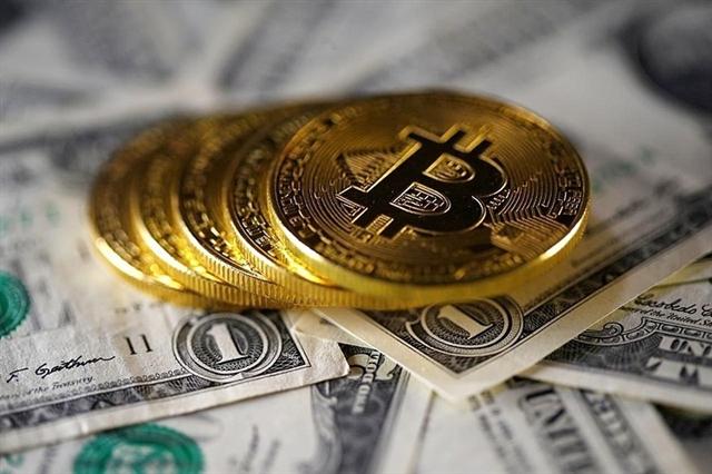 Giá Bitcoin vượt 8.000 USD