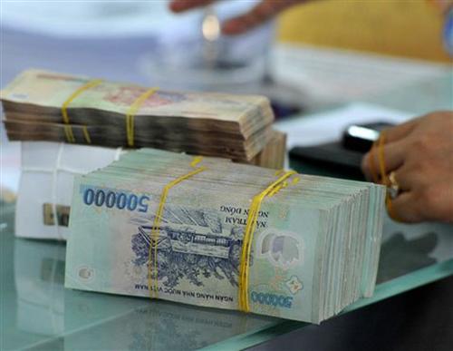 Vietnamese currency predicted to continue weakening: Fitch