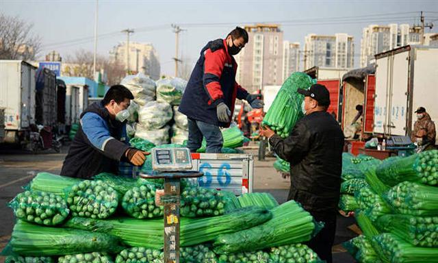 Thực phẩm Trung Quốc đắt đỏ vì lũ lụt và Covid-19
