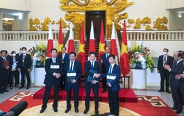 Japan, Vietnam firms ink billion-dollar gas power projects during Suga's visit