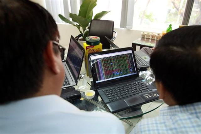 Main index ends lower, weighed down by profit-taking