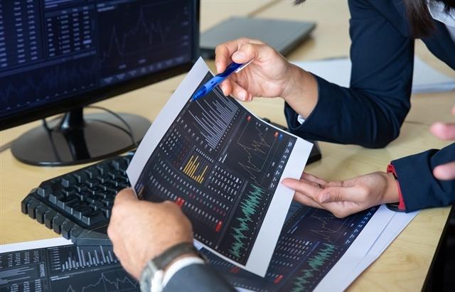 Securities firms rake in revenues after bumper year