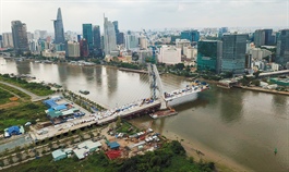 Land clearance roadblock delays major Saigon bridge completion
