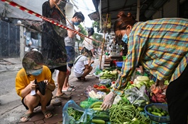 Hanoi to issue food stamps for limited weekly shopping