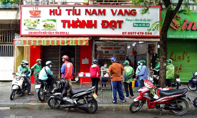 HCMC businesses thrive on reopening day