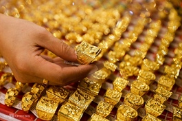 Vietnam gold sales plunge by half