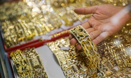 Gold prices hit 15-month high