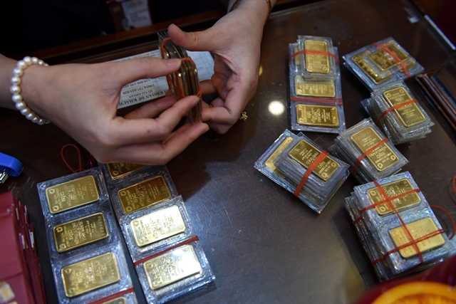 Giá vàng hôm nay 5.7.2022: Vàng miếng SJC cao hơn nữ trang 15 triệu đồng/lượng - ảnh 1