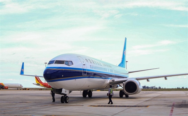 Chuyến bay thương mại đầu tiên đưa khách từ Trung Quốc đến Nha Trang - Khánh Hòa sau dịch. Ảnh: CR