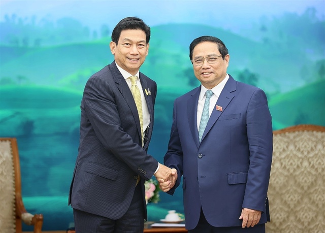 Prime Minister Pham Minh Chinh (R) hosts Thai Deputy Prime Minister and Foreign Minister Parnpree Bahiddha-Nukara. Photo: Vietnam News Agency