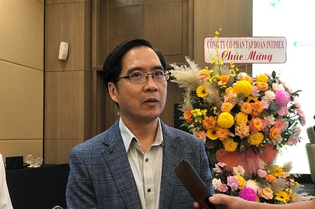 Ông Nguyễn Việt Anh – Tổng Giám đốc Công ty lương thực Phương Đông trả lời báo chí bên lề hội thảo. Ảnh: NHẪN NAM