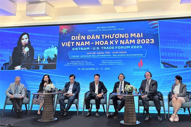 Các đại biểu đang trao đổi tại Diễn đàn thương mại Việt Nam - Mỹ vào ngày 21-11. Ảnh: TÚ UYÊN
