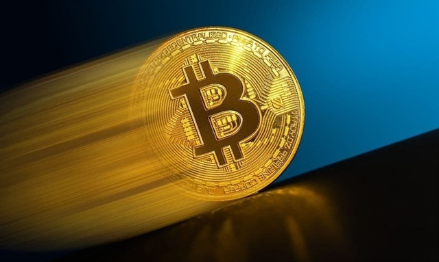 Bitcoin tích tắc tăng lên 48,000 USD nhờ tin giả | Vietstock