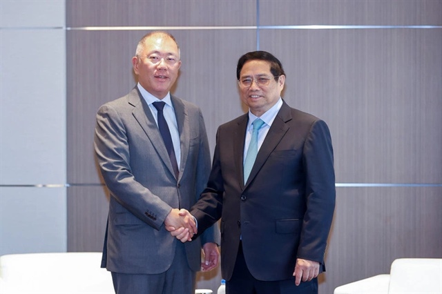 Jung Yeon In (L), vice chairman and COO of South Korea’s Doosan Enerbility Co., Ltd., and Vietnam’s Prime Minister Pham Minh Chinh at their working session in Seoul, South Korea on July 1, 2024. Photo: Nhat Bac / Tuoi Tre