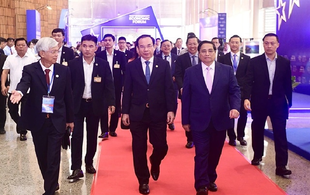 Vietnamese Prime Minister Pham Minh Chinh (R, 2nd) attends the fifth Ho Chi Minh City Economic Forum, which opened on September 25, 2024. Photo: Quang Dinh / Tuoi Tre