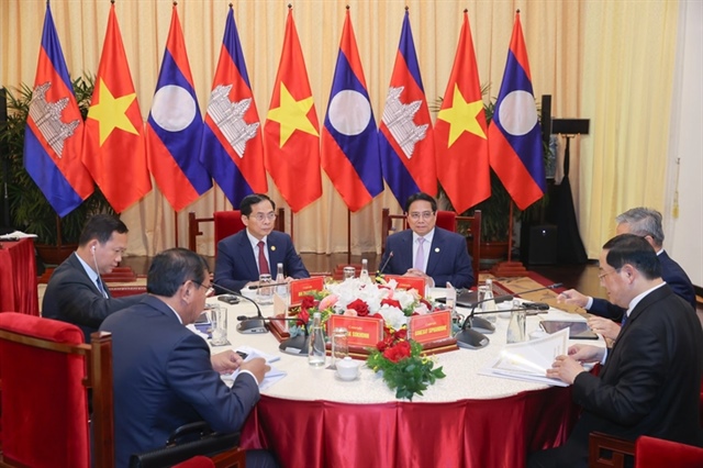 Vietnamese Prime Minister Pham Minh Chinh meets with his Laotian and Cambodian counterparts, Sonexay Siphandone and Hun Manet, respectively, along with other officials, in Ho Chi Minh City, Vietnam, February 22, 2025. Photo: Vietnam Government Portal