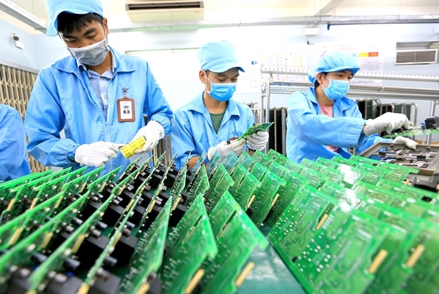 Việt Nam's manufacturers see optimistic outlook despite low February PMI