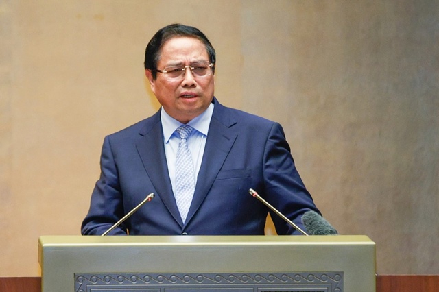 Thủ tướng Phạm Minh Chính đã trình bày những điểm mới trong các dự thảo văn kiện trình Đại hội XIV của Đảng. Ảnh: TUẤN MINH