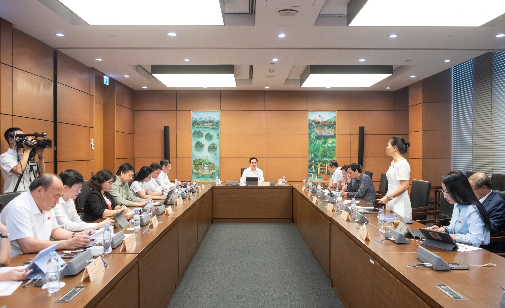Organization members discussing at a meeting