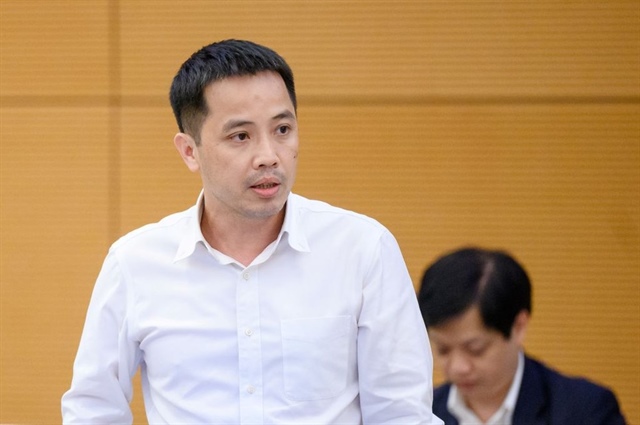 Ông Đậu Anh Tuấn, Phó Tổng thư ký VCCI nói cần có cơ chế để doanh nghiệp thỏa thuận nhận tội, đóng phạt và tiếp tục các hoạt động kinh doanh cốt lõi. Ảnh: QH