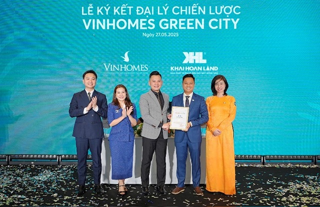 Representatives from both companies attending the event