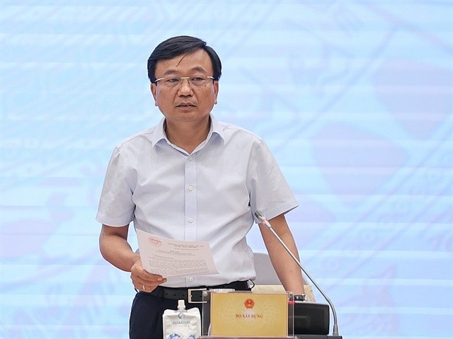 Nguyen Danh Huy, Deputy Minister of Construction, explained elimination construction licensing procedures