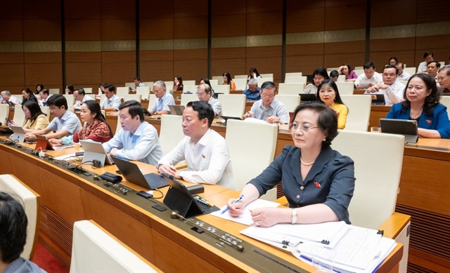 Các đại biểu tại phiên làm việc của Kỳ họp thứ 9, Quốc hội khóa XV. Ảnh: PHẠM THẮNG