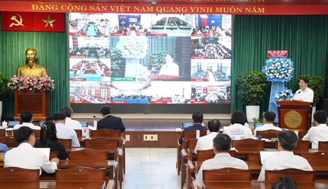 Điểm cầu tại UBND TP.HCM kết nối với 168 phường, xã, đặc khu. Ảnh: THUẬN VĂN