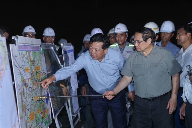 Prime Minister Pham Minh Chinh inspecting the Ho Chi Minh City Ring Road 3 project, Tan Van - Nhon Trach section, including the Nhon Trach Bridge, on the evening of August 2 - Photo: VGP/Nhat Bac