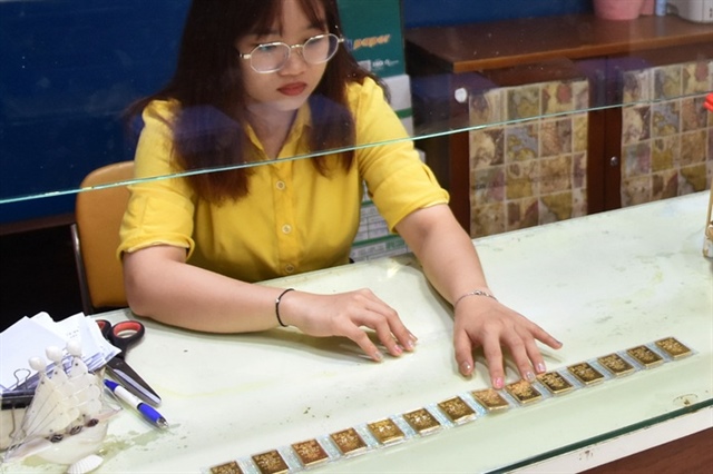 Giá vàng hôm nay 24-8: Cửa hàng nhỏ đẩy giá vàng miếng SJC lên 128 triệu đồng/lượng- Ảnh 2.