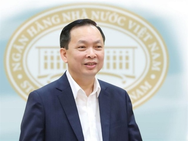 Phó thống đốc Ngân hàng Nhà nước khẳng định vai trò ổn định kinh tế Việt Nam - Ảnh 1.