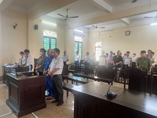 Các bị cáo trong phiên toà ngày 22-7. Ảnh: HỮU ĐĂNG