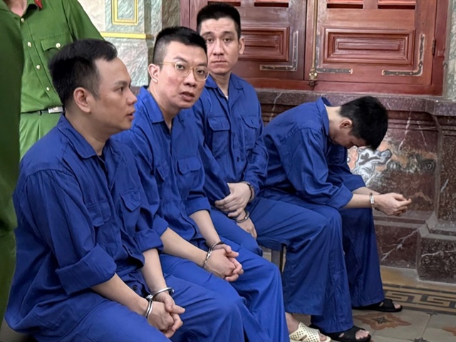 Dùng công nghệ ẩn danh để giao dịch tiền giả tại TP HCM: Phiên tòa xét xử - Ảnh 1.