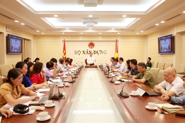 Deputy Minister of Construction Nguyen Van Sinh chaired the meeting. Photo: MoC