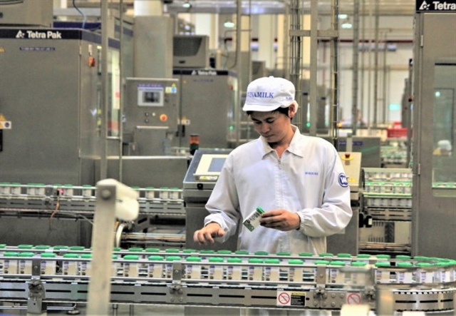 VN-Index records historical high on upgrade news