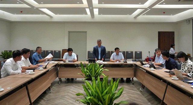 Thứ trưởng Bộ Tư pháp Nguyễn Thanh Tú chủ trì hội đồng thẩm định. Ảnh: HOÀNG HUY