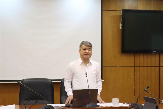 Thứ trưởng Bộ Tư pháp Nguyễn Thanh Tú phát biểu tại cuộc họp. Ảnh: Hoàng Huy