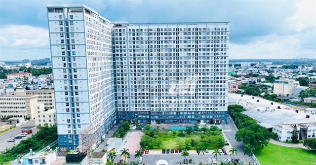 Chung cư gần 1.000 căn ở TPHCM: Khép lại tranh chấp, cư dân nhận sổ hồng 1 Chung cư gần 1.000 căn ở TPHCM: Khép lại tranh chấp, cư dân nhận sổ hồng