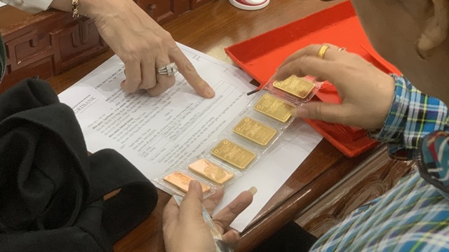 Giá vàng miếng SJC và vàng nhẫn duy trì mốc cao ngày 8 - 11 - Ảnh 2.