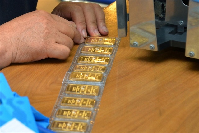 Giá vàng hôm nay 9 - 12 giảm mạnh theo thị trường thế giới - Ảnh 2.