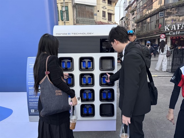 Các 'ông lớn' đua nhau làm xe máy điện - Ảnh 1.