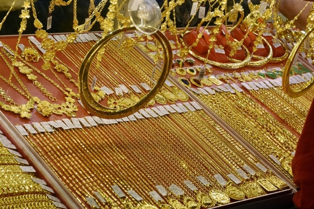 Giá vàng SJC tăng mạnh 14 - 2 nhờ phục hồi giá vàng thế giới - Ảnh 1.