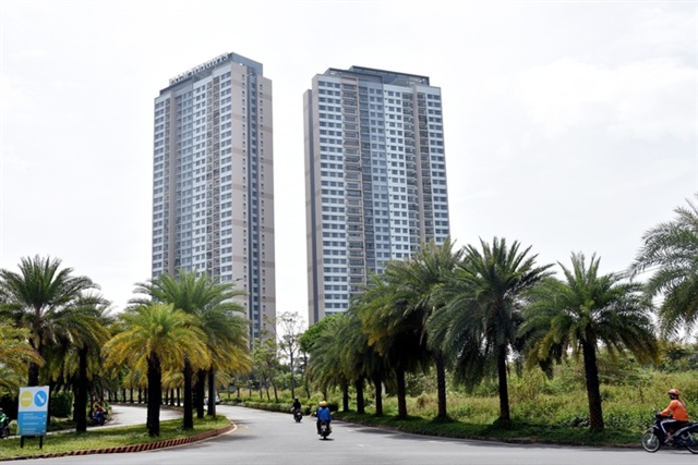 Người mua nhà thấp thỏm vì lãi vay - Ảnh 1.