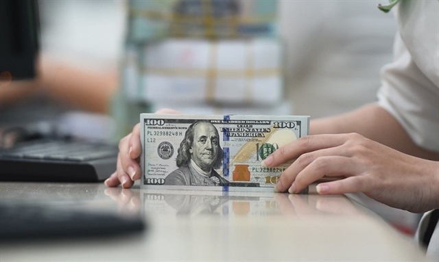 Giá USD tại các ngân hàng thương mại đồng loạt chạm mức trần 26.307 đồng/USD, phản ánh áp lực tỉ giá ngắn hạn gia tăng. Ảnh minh họa