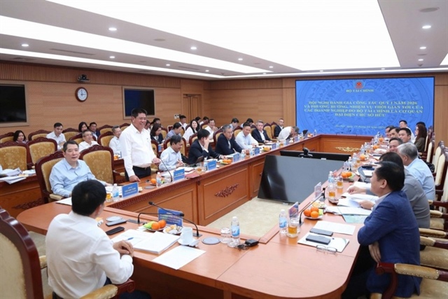 Vietnam urges SOEs to lead tech drive for double-digit growth