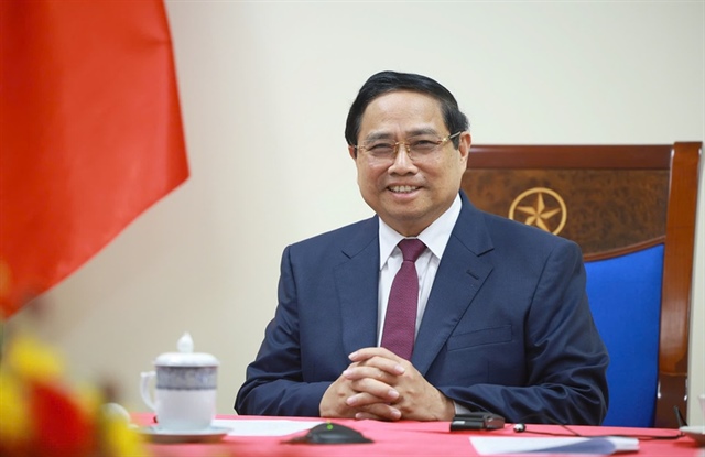 Thủ tướng Phạm Minh Chính điện đàm với Thủ tướng Algeria, đề nghị hỗ trợ Việt Nam bảo đảm an ninh năng lượng- Ảnh 1.