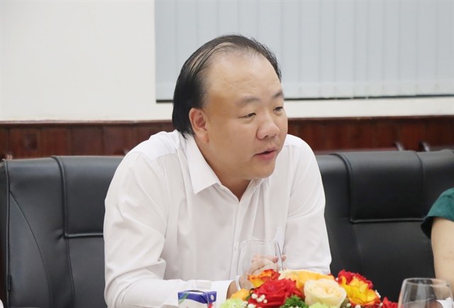 Ông Trần Hữu Linh - Cục trưởng Cục Quản lý và Phát triển thị trường trong nước phát biểu tại cuộc họp.